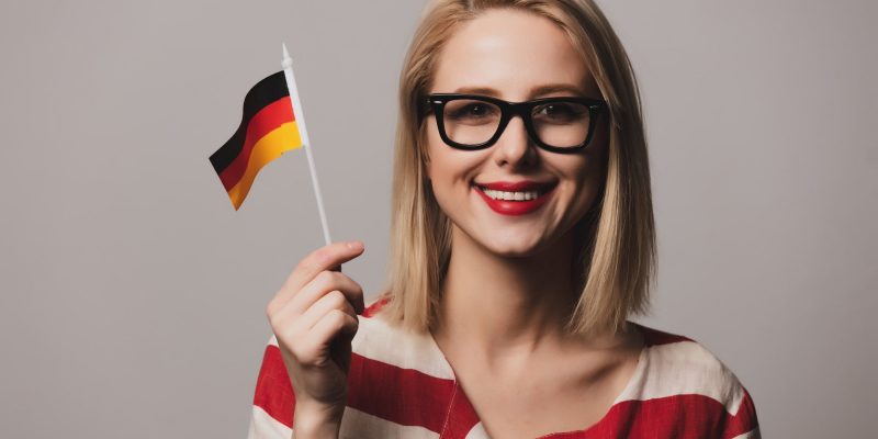 beatiful girl holds German flag